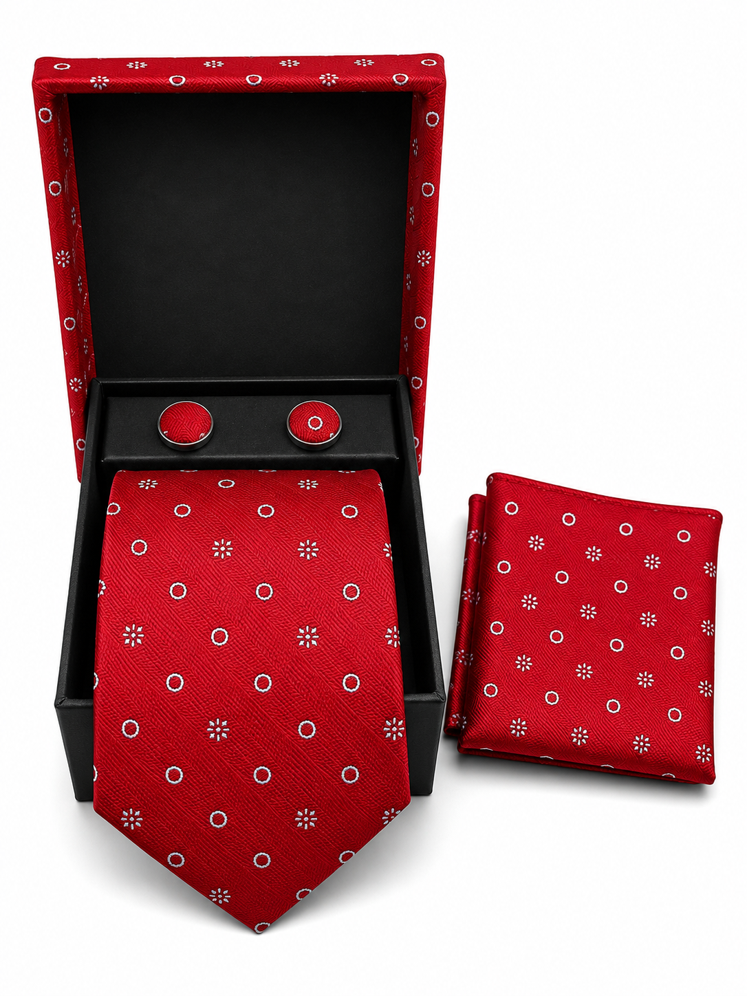 A dark red necktie and matching pocket square set displayed in an open black gift box, with two matching red cufflinks also visible on a white background.